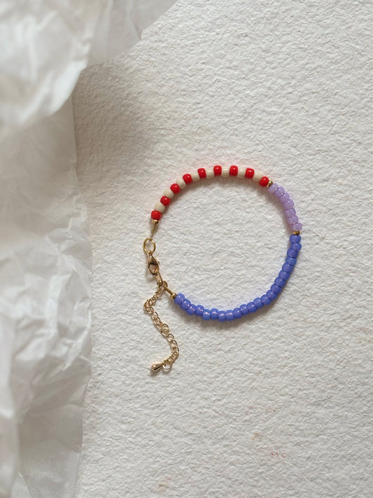 Perlenarmband- lilac/orangerot-creme